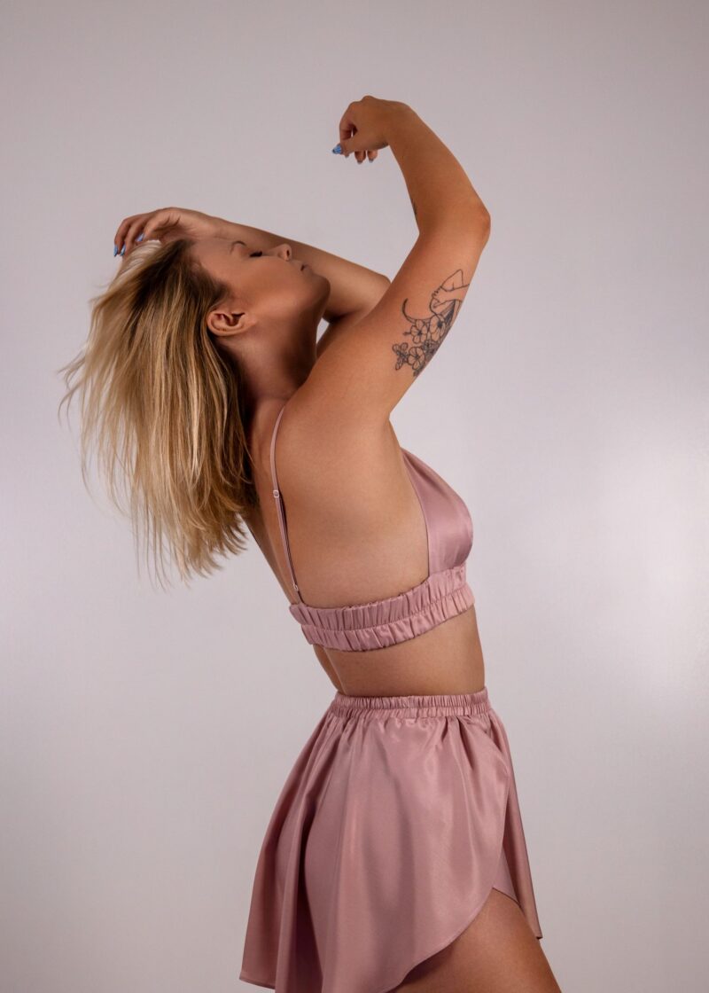 Two-piece pajamas made of pink viscose satin, consisting of a top and shorts
